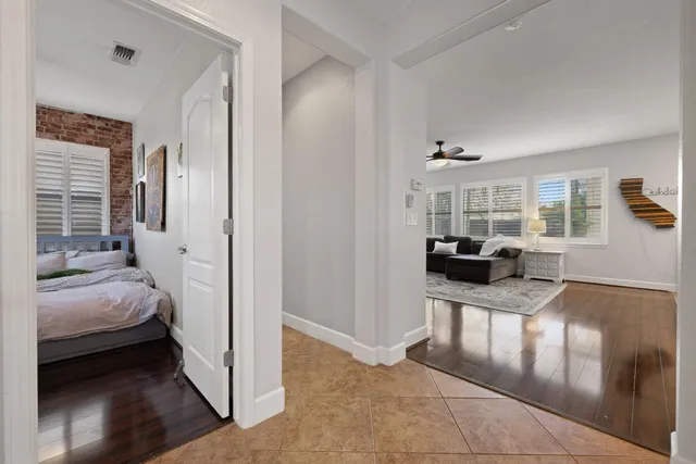 a kitchen with granite countertop a sink and cabinets