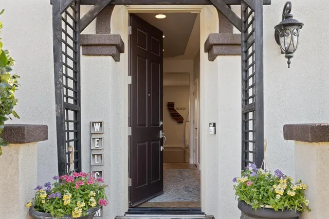 a view of a livingroom with furniture and a flat screen tv