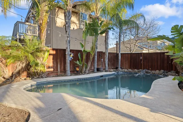 a kitchen that has a sink and a stove