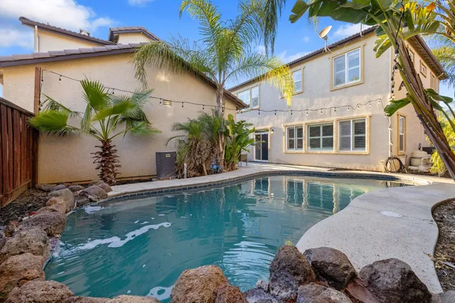 a kitchen with a stove and a sink