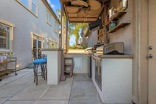 a bedroom with furniture and a wooden floor