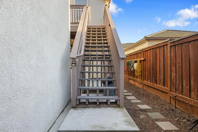 a kitchen with stainless steel appliances a stove a microwave and sink