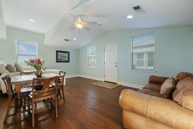 a bathroom with a shower and a sink