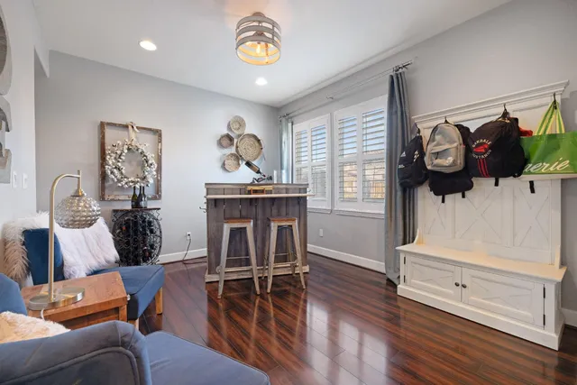 a bedroom with furniture and a window