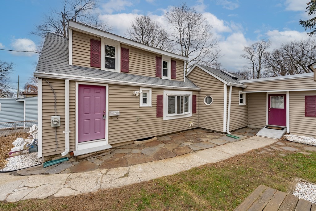 51 Littleton Street Springfield, MA 01104 - Photo 5 of 36 a front view of a house with a garage