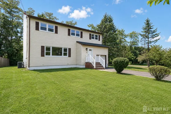 a house view with a garden space