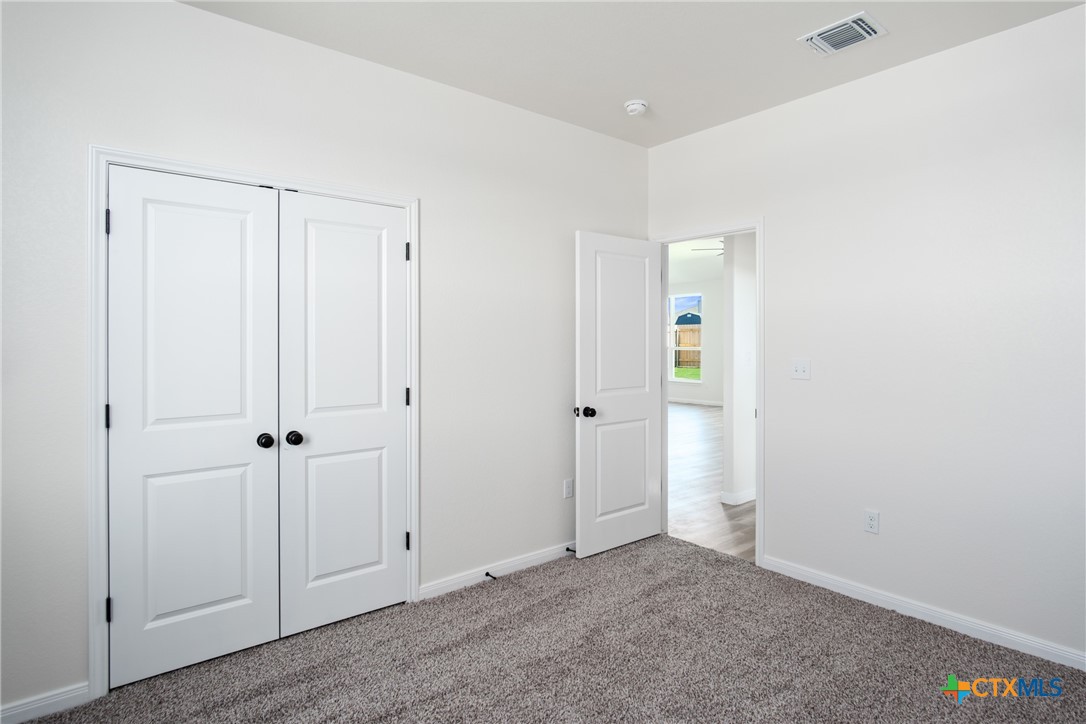 1013 Lago Azul Lane Temple, TX 76504 - Photo 20 of 32 an empty room with closet area