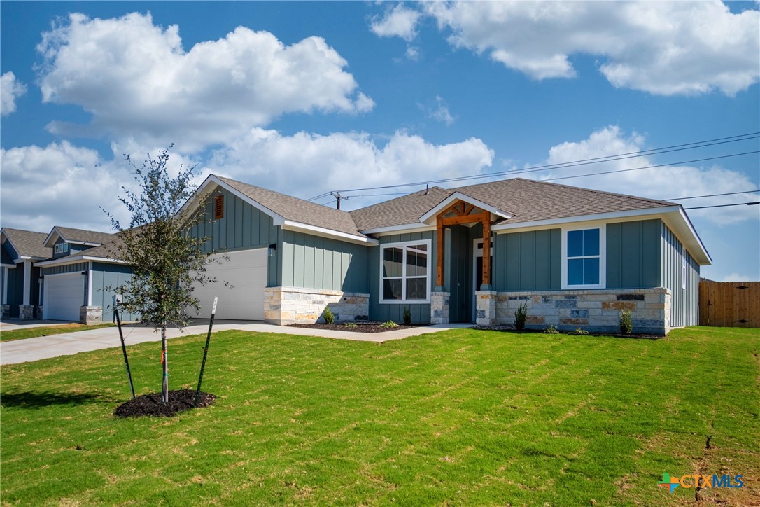 1013 Lago Azul Lane Temple, TX 76504 - Photo 2 of 32 a view of a house with a yard and sitting area