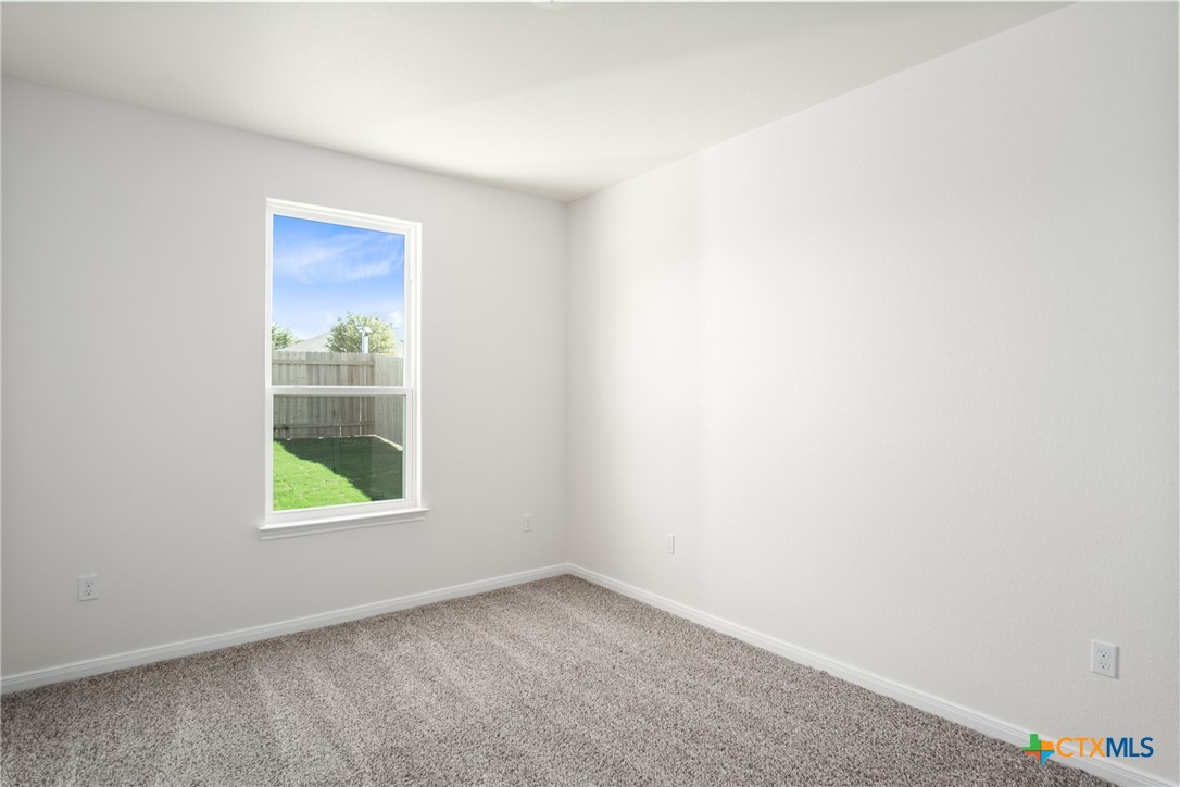 1013 Lago Azul Lane Temple, TX 76504 - Photo 21 of 32 a view of an empty room with a window