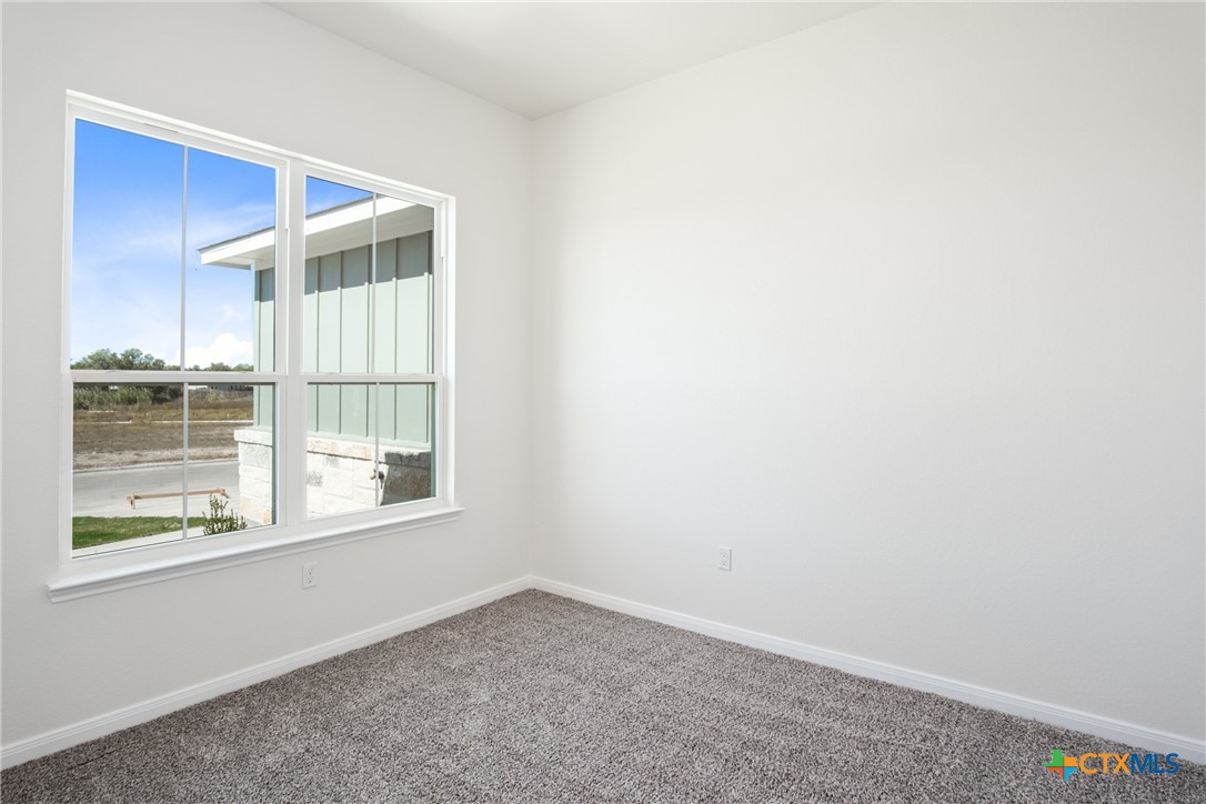 1013 Lago Azul Lane Temple, TX 76504 - Photo 24 of 32 an empty room with a window