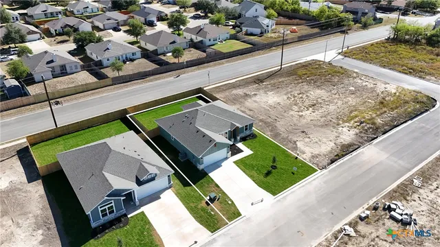 a front view of a house with a garage