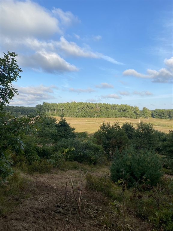 83 Wapping Road Kingston, MA 02364 - Photo 7 of 7 a view of a lake with houses in the back