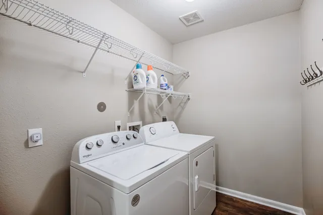 a utility room with dryer and washer