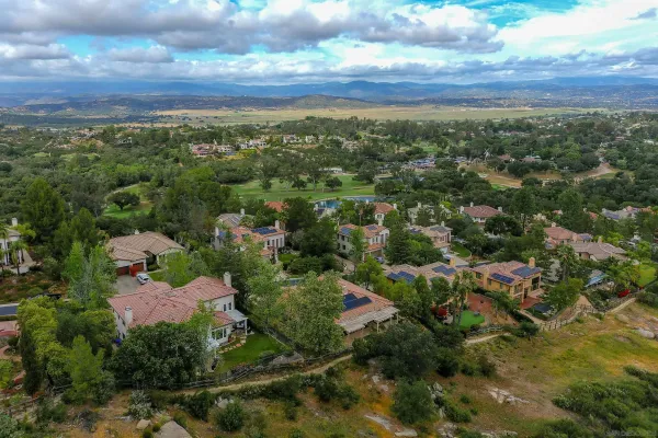 an aerial view of residential house with outdoor space