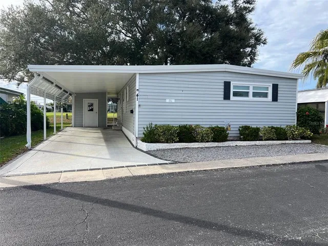a view of a house with a garage