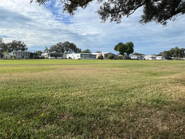 a view of an ocean and houses
