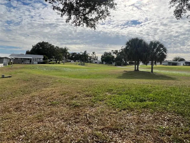 a view of a golf course with a yard