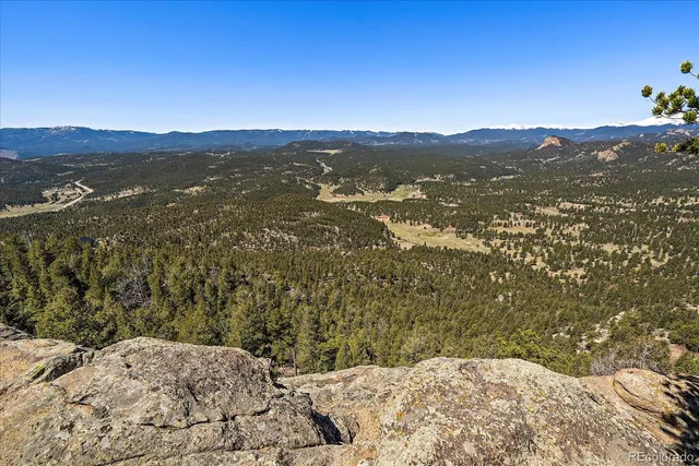 a view of lake with mountain