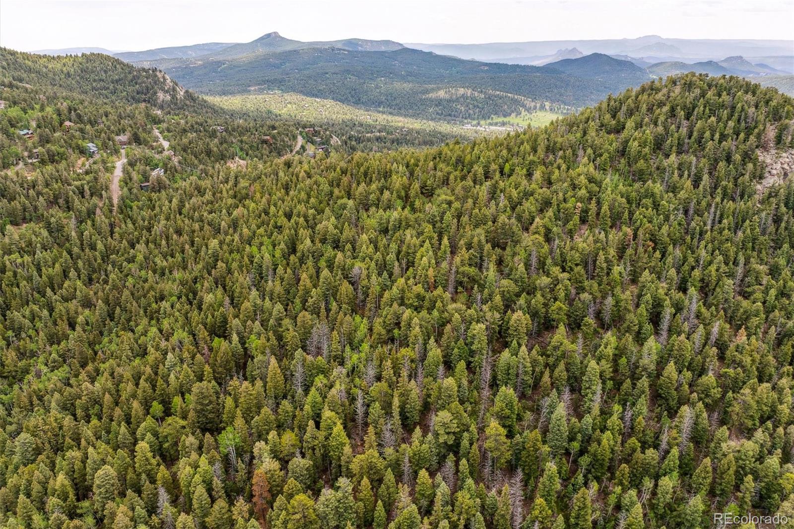 0 Pike View Drive Conifer, CO 80433 - Photo 29 of 31 a view of a lush green hillside and a mountain view