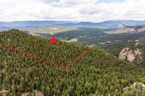 a view of mountain with lake