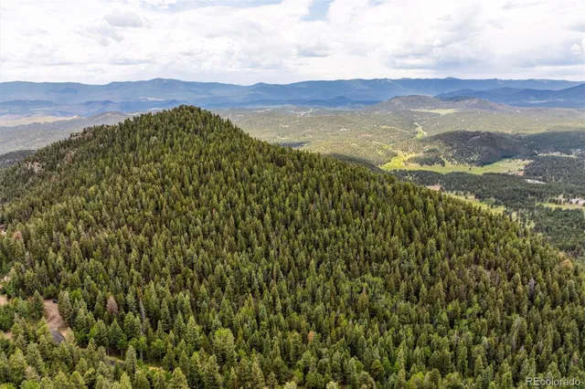 a view of mountain with lake