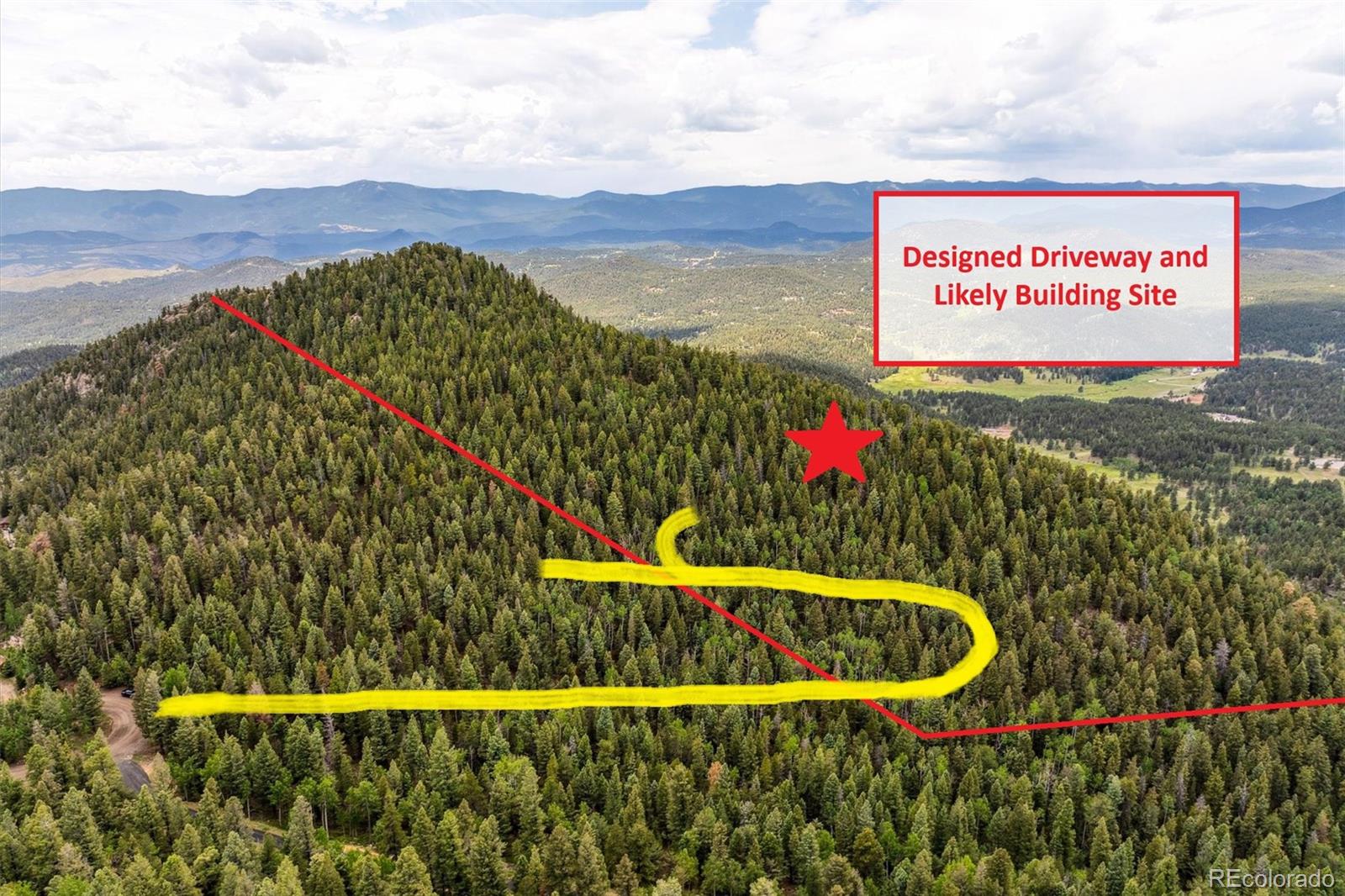 0 Pike View Drive Conifer, CO 80433 - Photo 7 of 31 a sign that is sitting on a flower in front of a building