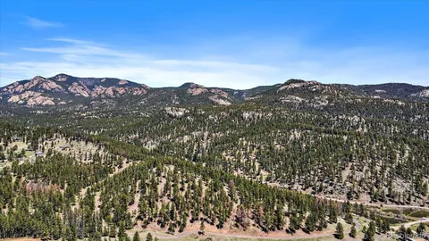 a view of a city with a mountain