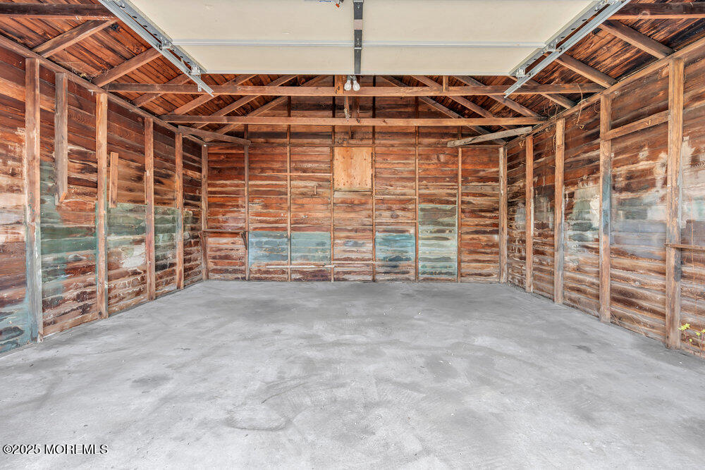 737 20th Avenue Lake Como, NJ 07719 - Photo 20 of 29 a view of an empty room with storage