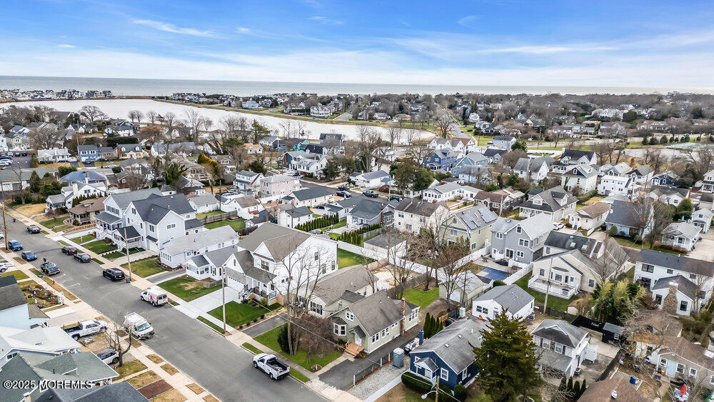 737 20th Avenue Lake Como, NJ 07719 - Photo 2 of 29 an aerial view of a city with lots of residential buildings