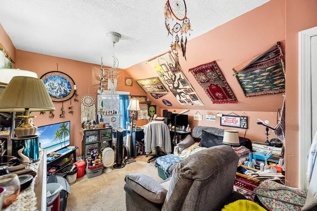 a room with furniture and a chandelier