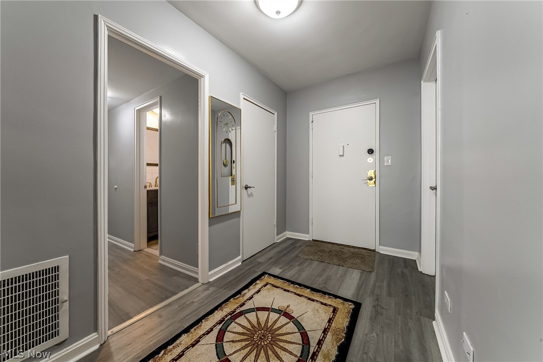 13800 Fairhill Road, Unit 306 Cleveland, OH 44120 - Photo 39 of 48 Entrance foyer featuring dark wood-style floors and baseboards