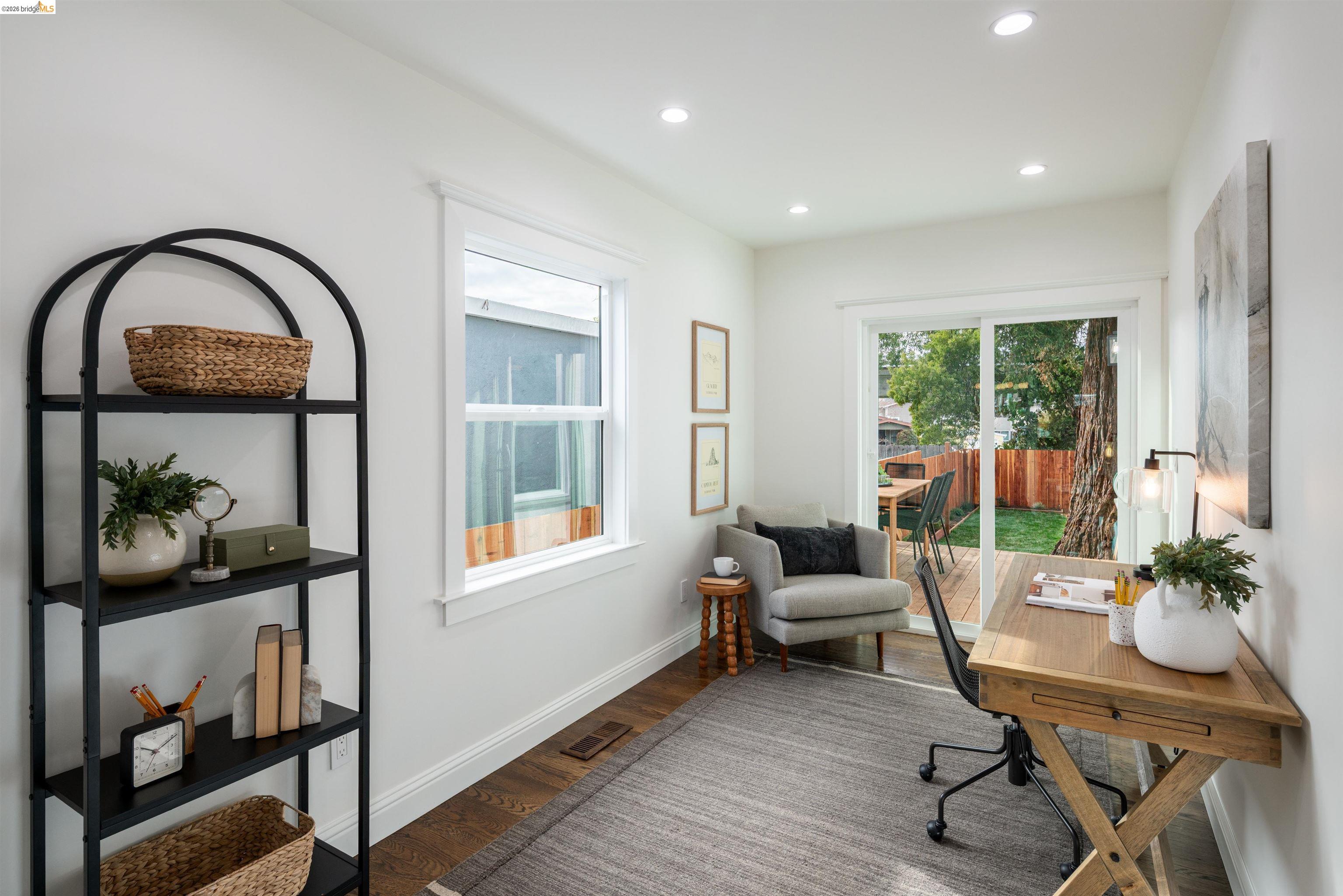 820 Key Rte Boulevard Albany, CA 94706 - Photo 15 of 48 a living room with furniture and a window