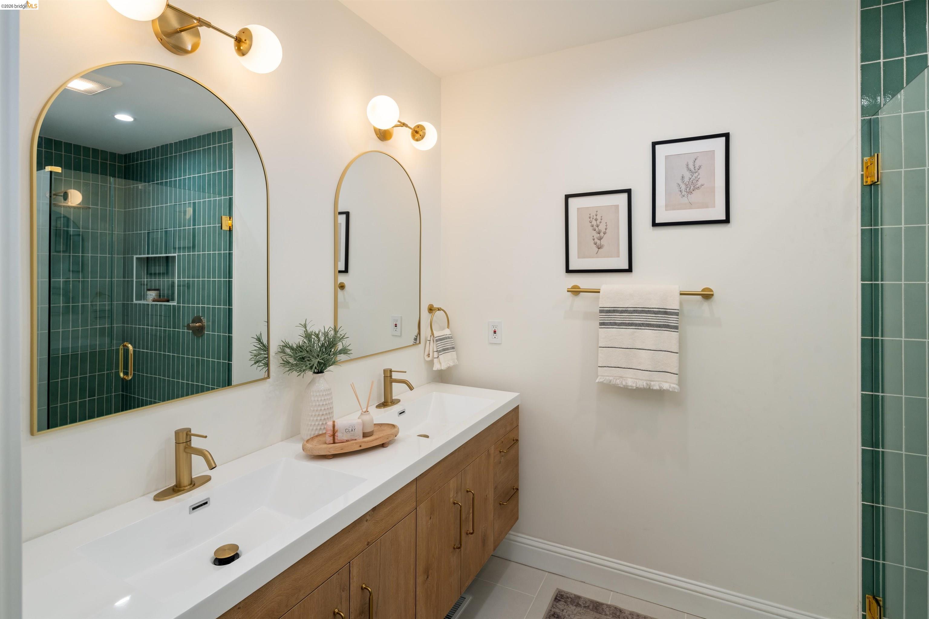 820 Key Rte Boulevard Albany, CA 94706 - Photo 22 of 48 a bathroom with a double vanity sink mirror and
