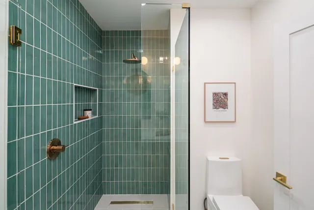 a living room with furniture flowerpot and a window