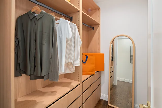 a view of a bedroom with furniture and staircase