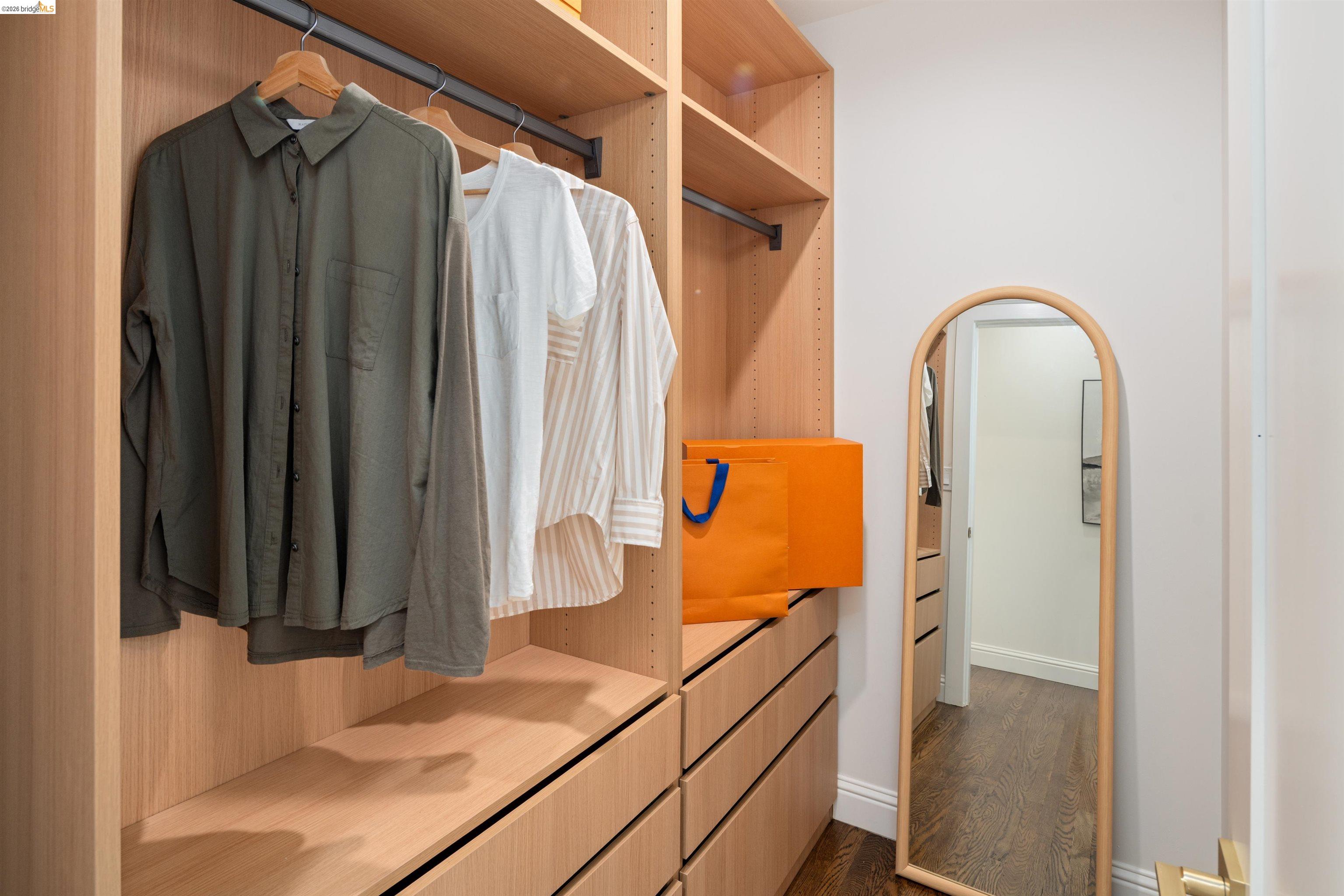 820 Key Rte Boulevard Albany, CA 94706 - Photo 26 of 48 a view of walk in closet with clothes and shoes