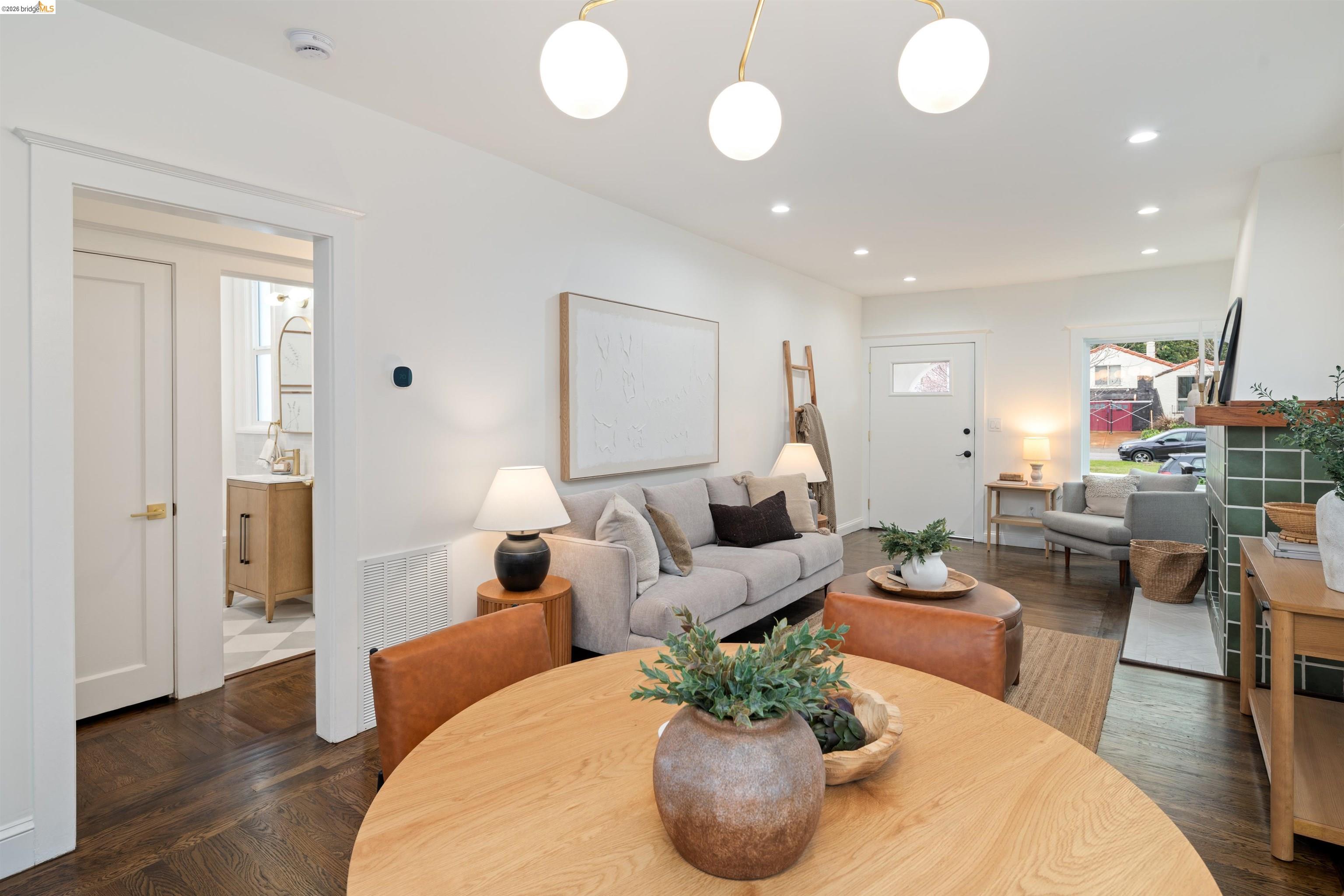 820 Key Rte Boulevard Albany, CA 94706 - Photo 27 of 48 a living room with furniture potted plant and a window