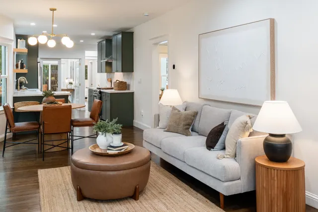 a bathroom with a toilet a sink and a mirror