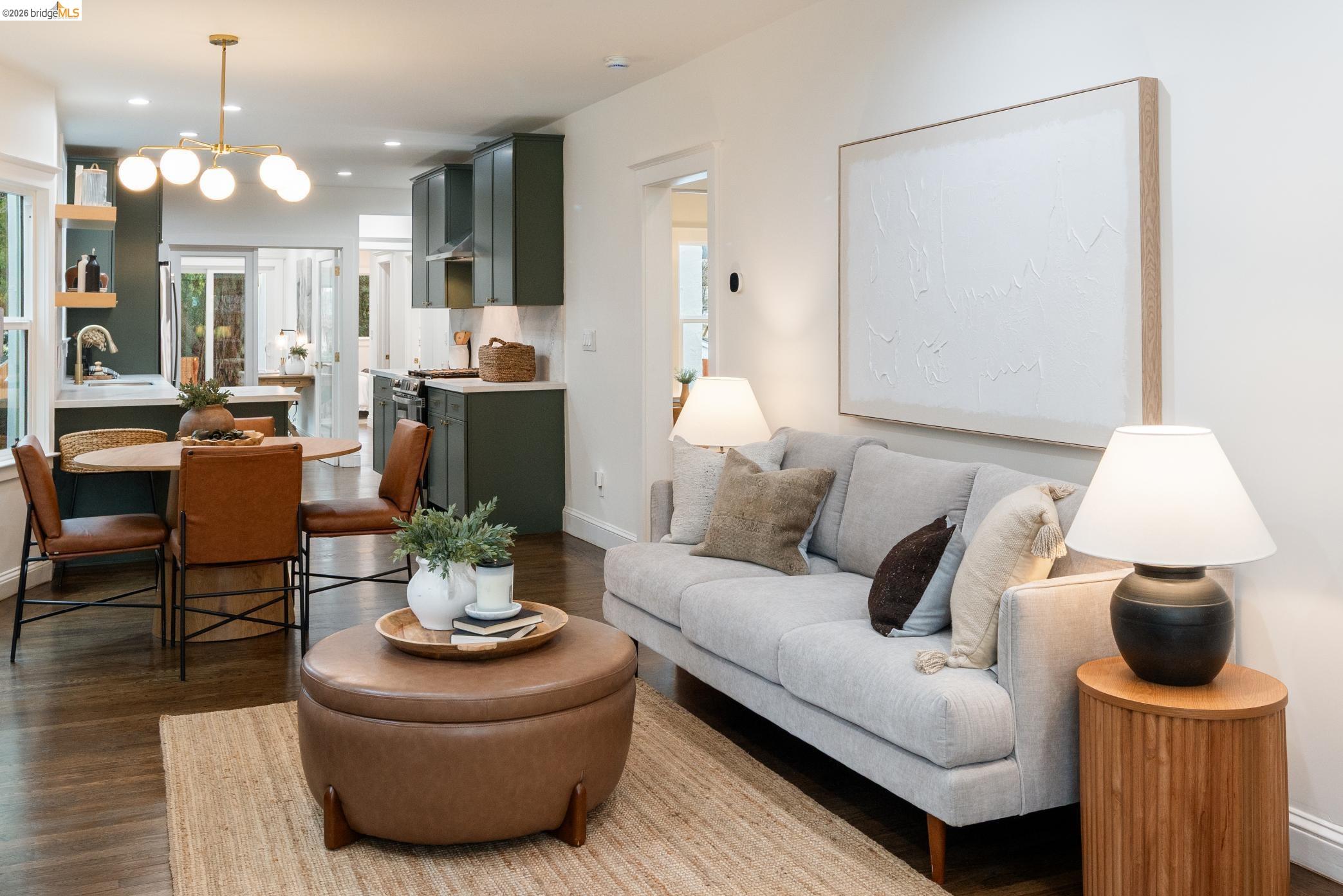 820 Key Rte Boulevard Albany, CA 94706 - Photo 4 of 48 a living room with furniture and a chandelier