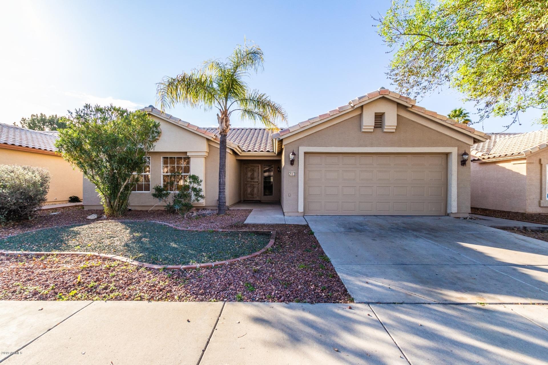 213 West Marco Polo Road Phoenix, AZ 85027 - Photo 1 of 21 a front view of a house with garden