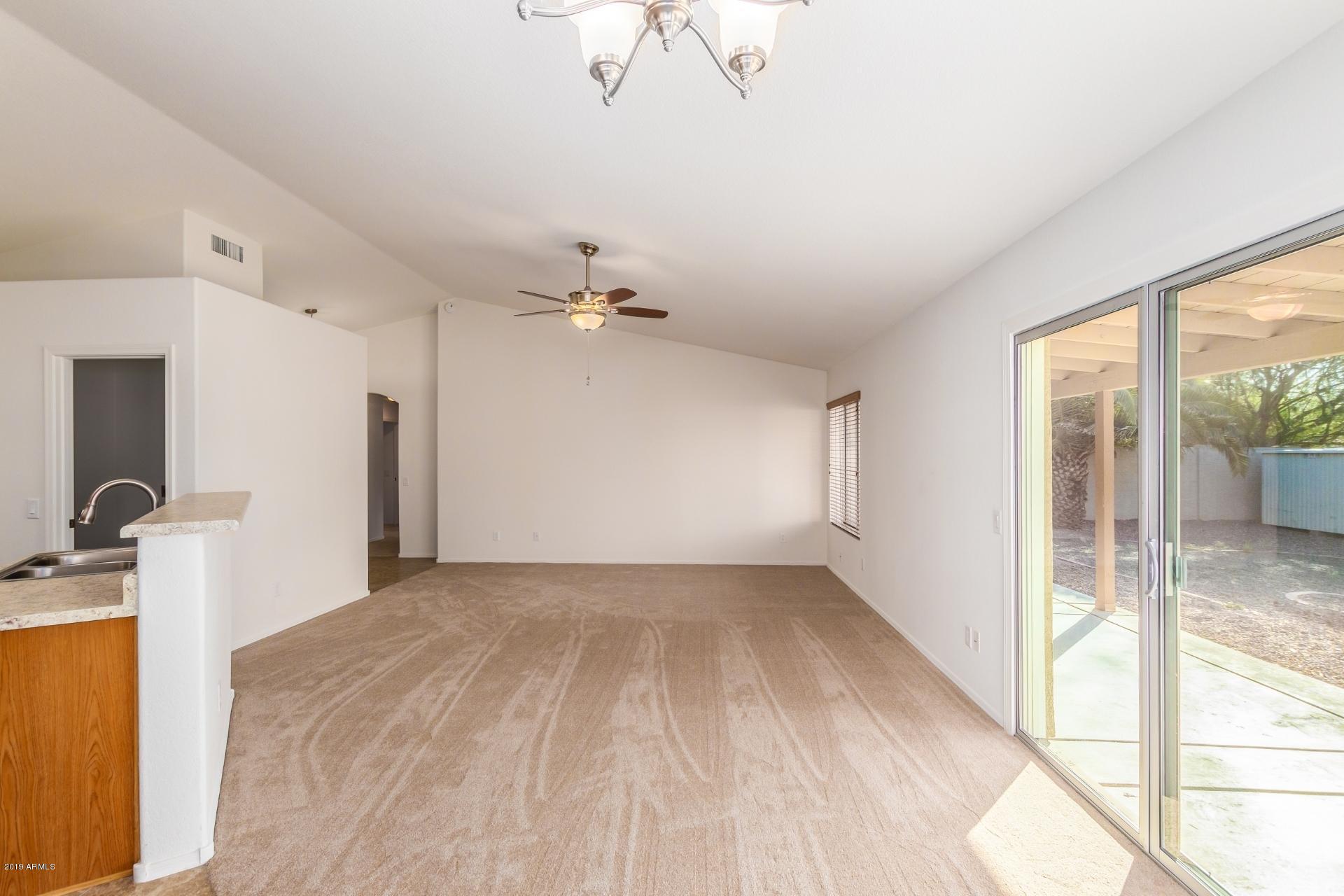 213 West Marco Polo Road Phoenix, AZ 85027 - Photo 7 of 21 a view of a livingroom with a staircase