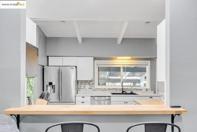 a room with a table and chairs