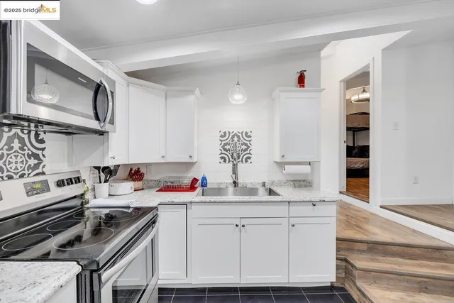 a view of staircase with white walls