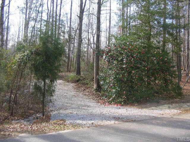 C2340 Osage Spring, Unit C2340 Spring Hope, NC 27882 - Photo 1 of 7 a view of a yard with trees