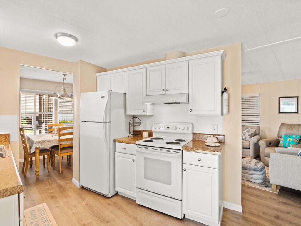 4800 Southeast Federal Highway, Unit 76 Stuart, FL 34997 - Photo 13 of 32 a room with storage and utility