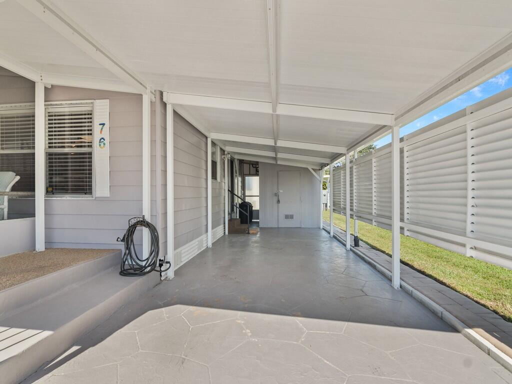 4800 Southeast Federal Highway, Unit 76 Stuart, FL 34997 - Photo 25 of 32 a view of a room with gym equipment