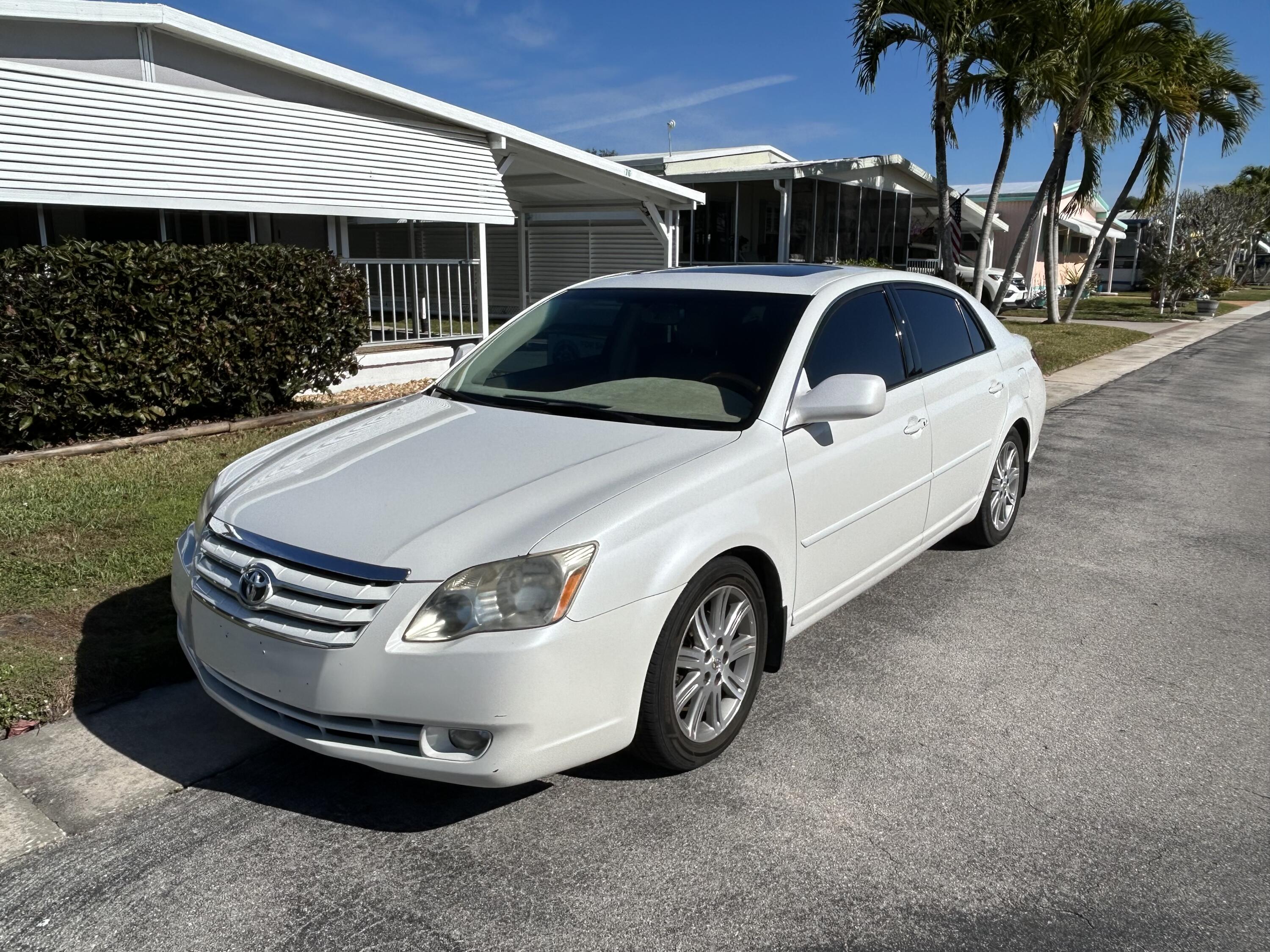 4800 Southeast Federal Highway, Unit 76 Stuart, FL 34997 - Photo 31 of 32 a car parked in front of house