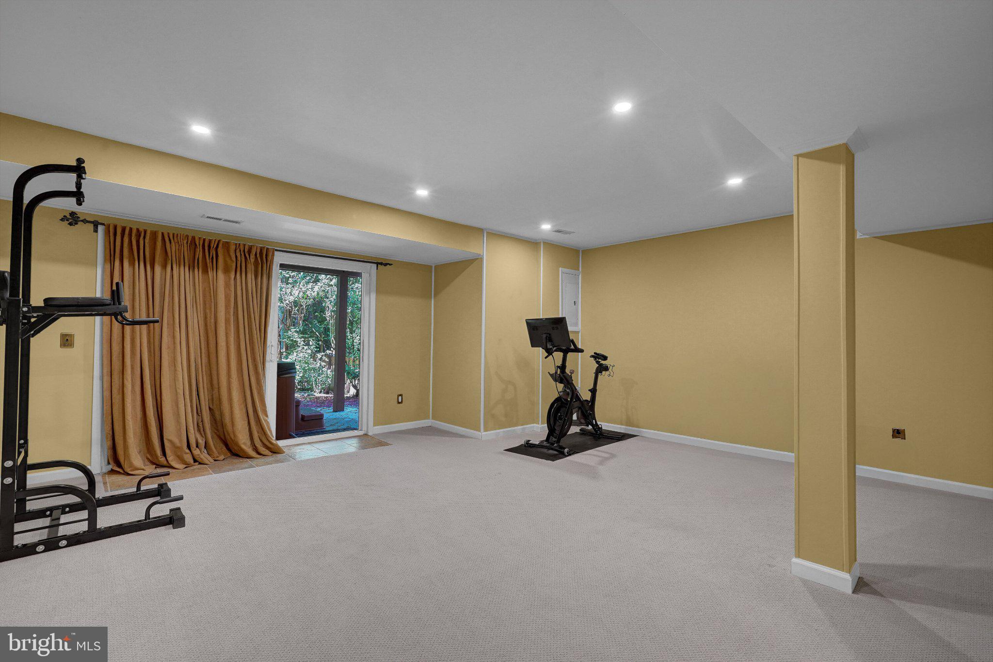2382 Generation Drive Reston, VA 20191 - Photo 29 of 49 Spacious basement gym with natural light.