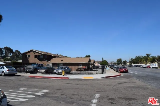a view of car parked on the side of road