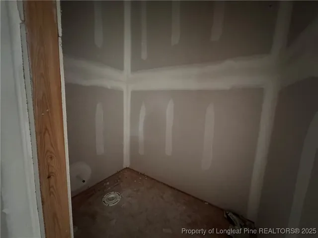 a view of a patio with a table chairs and a backyard